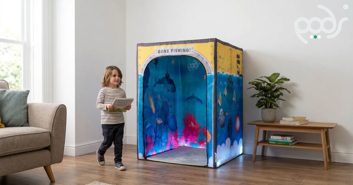 Child approaching a correctly scaled PODSgo Sub Aqua Adventure Bundle in a contemporary indoor playroom.