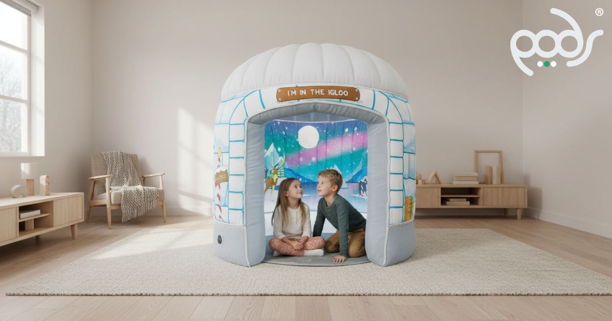 Full-size Polar Ice Igloo in a modern playroom with two children beginning an Arctic adventure.