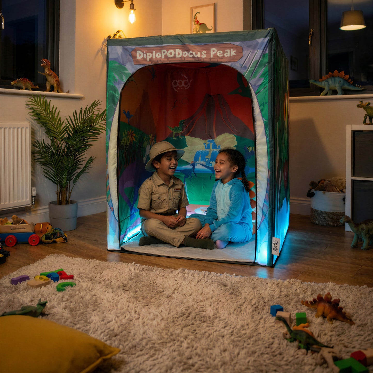 Walking With Dinosaurs PODSgo pop up play tent in a living room, view 1